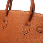 Genuine Leather Twist Lock Handbag with Gold Hardware and Pockets for Women