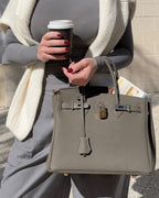 Genuine Leather Twist Lock Handbag with Gold Hardware and Pockets for Women