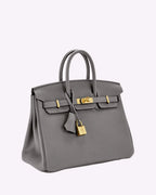 Genuine Leather Twist Lock Handbag with Gold Hardware and Pockets for Women