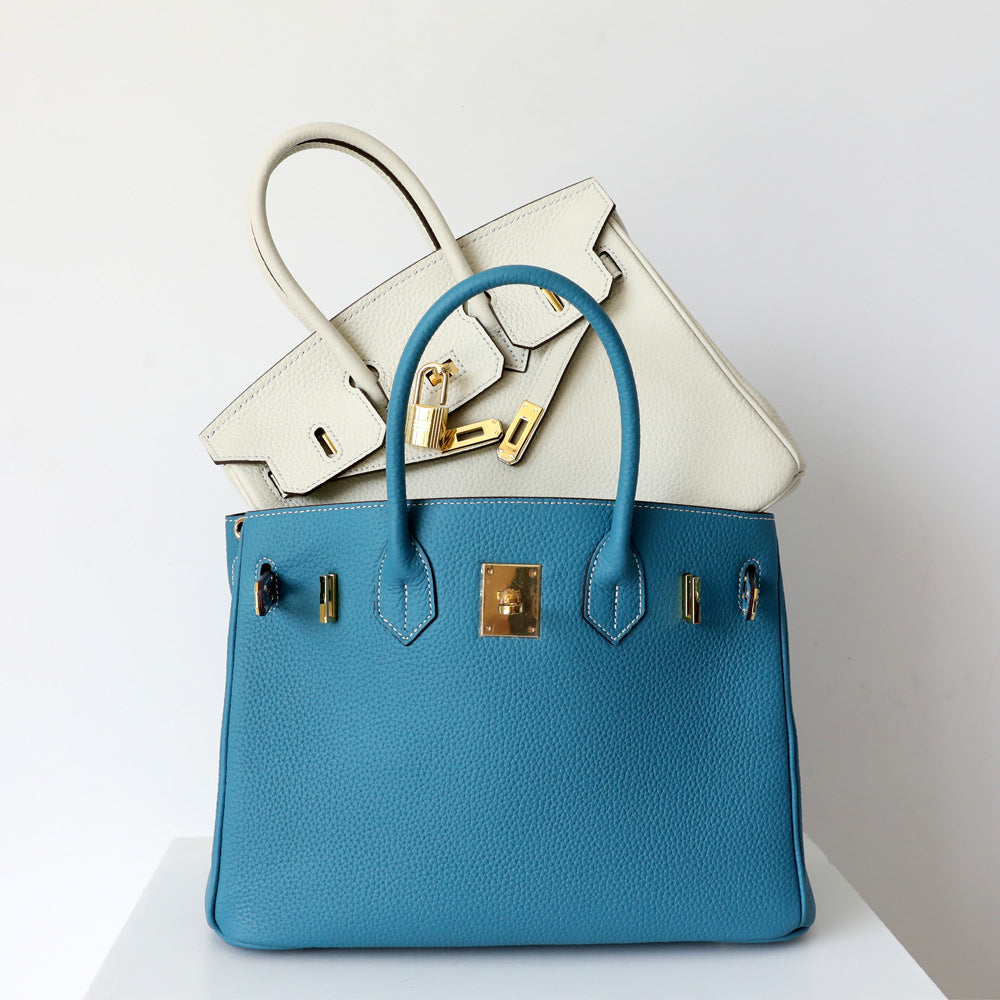 Genuine Leather Twist Lock Handbag with Gold Hardware and Pockets for Women