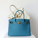 Genuine Leather Twist Lock Handbag with Gold Hardware and Pockets for Women